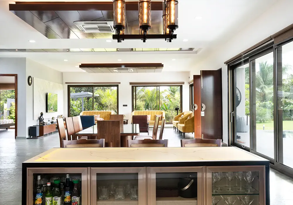 Living and dining area seen across the bar counter