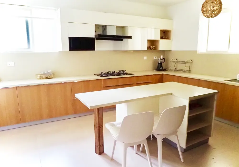 Veneer kitchen with a white island and seating